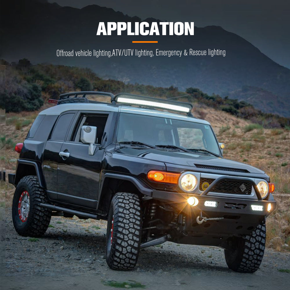 Black off-road vehicle with additional lights on a mountainous landscape