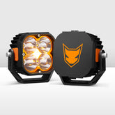 Two black and orange LED vehicle pod lights with a Lightfox logo on a white background