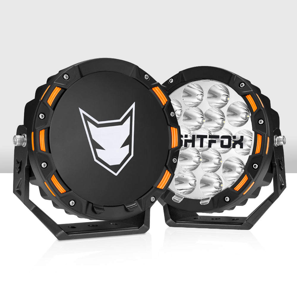Two black and orange lights with a brand logo on a white background
