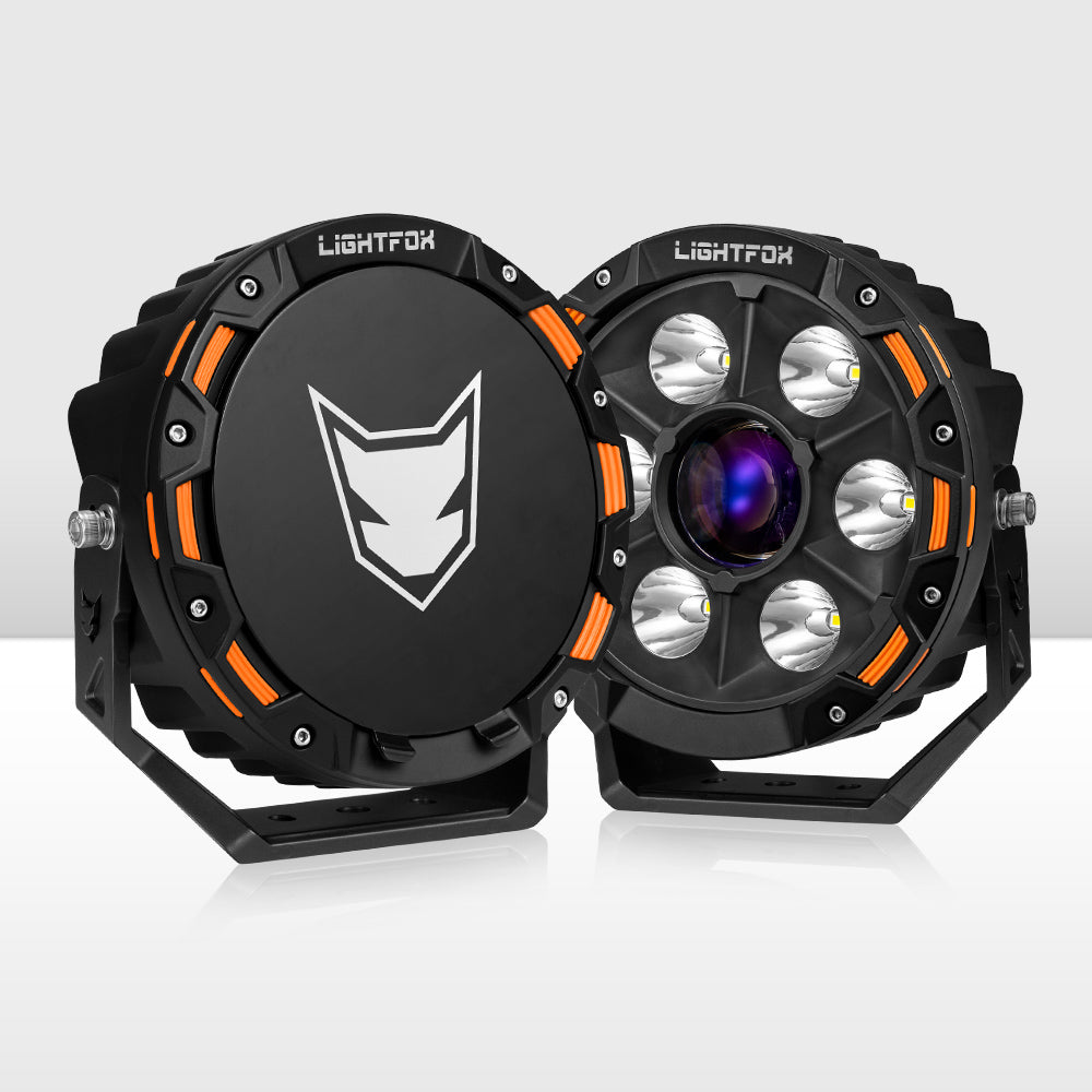 Two black and orange light fixtures with a visible brand logo on a white background