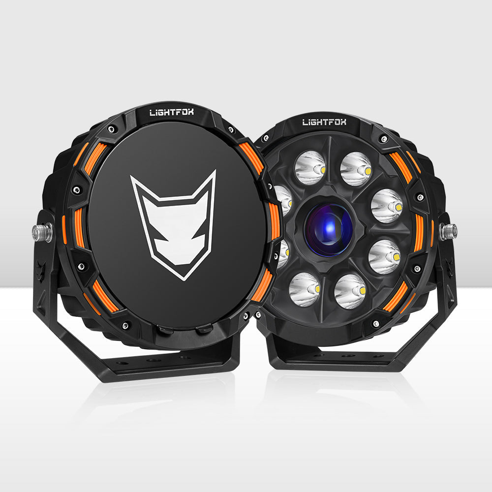 Two black and orange LED lights with a visible brand logo on a white background